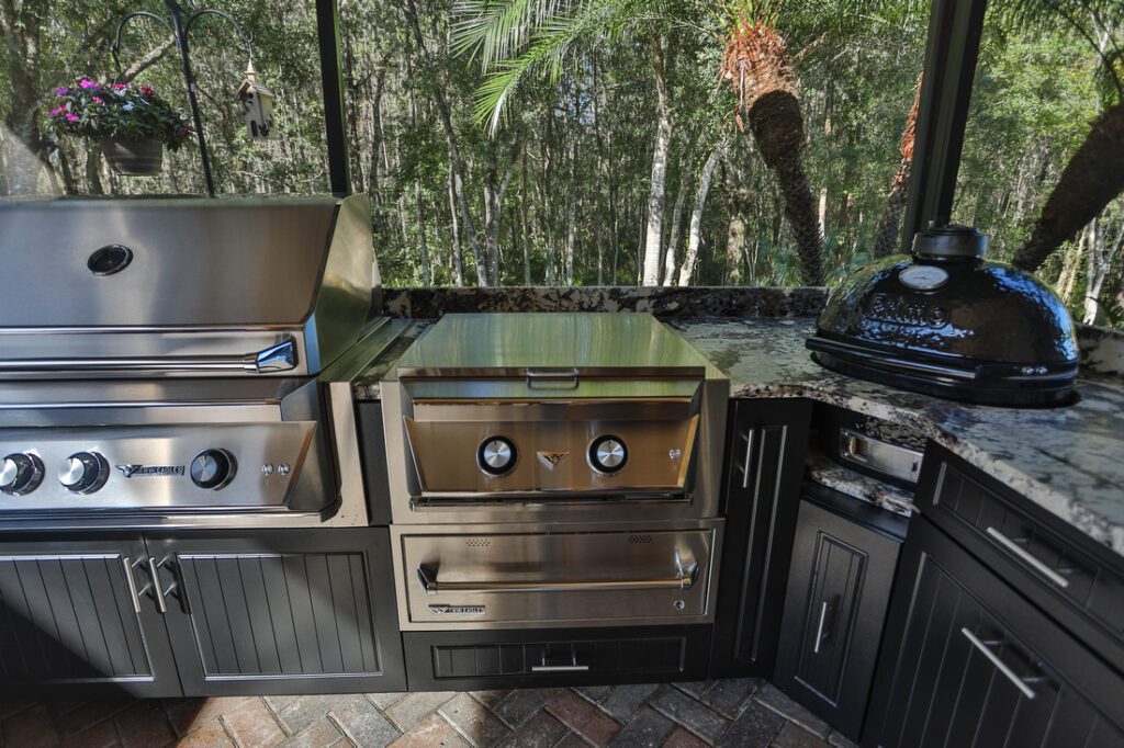 smoker and grill in custom outdoor kitchen 